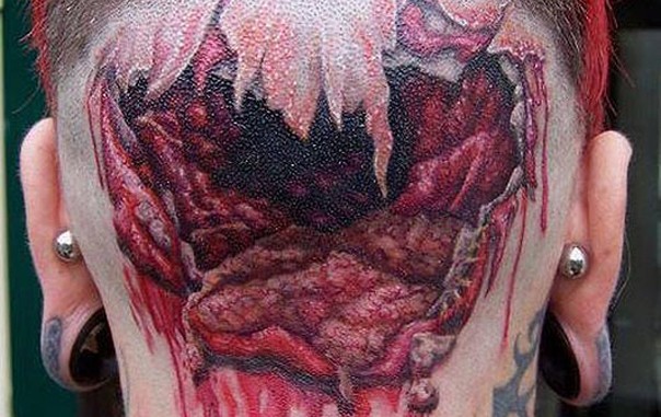 DWP hole in head tattoo 060612